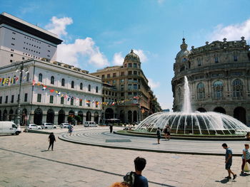Group of people in front of building