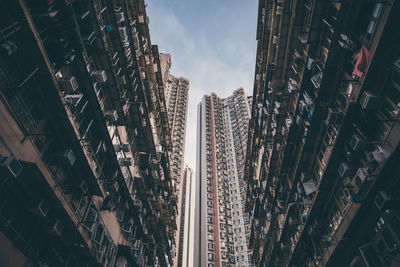 Low angle view of cityscape against sky