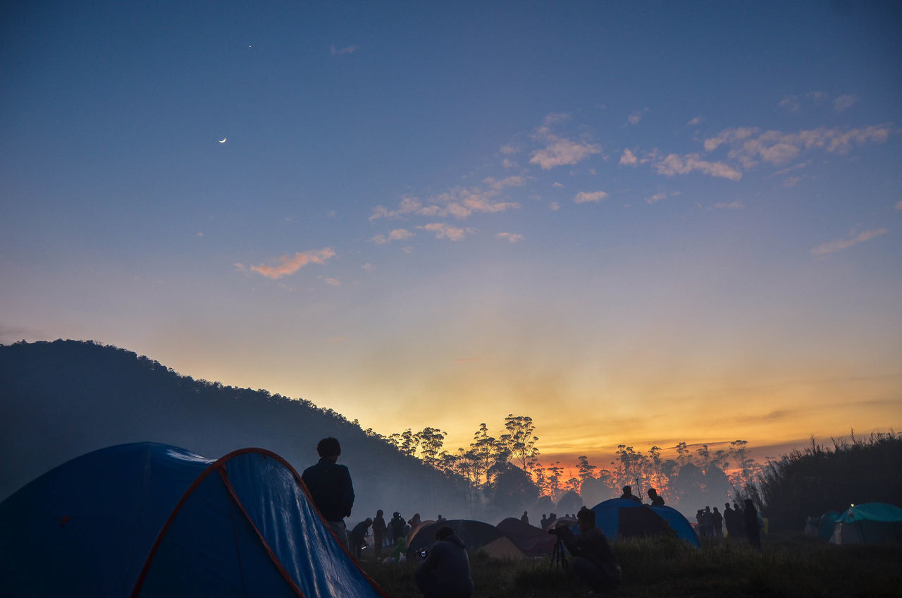 PANORAMIC VIEW OF TENT AGAINST SKY DURING SUNSET