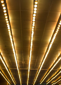 Low angle view of illuminated ceiling