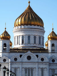 Low angle view of church against blue sky