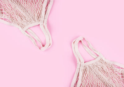 Close-up of basket against pink background