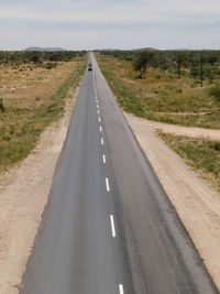 Road amidst landscape against sky