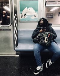 Woman sitting in train