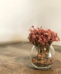 Close-up of flower vase on table