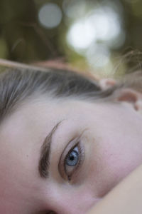 Cropped eye of young woman