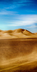 Scenic view of desert against sky