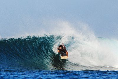 Man surfing in sea