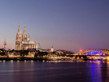 Bridge over river at night