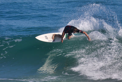 Man surfing in sea