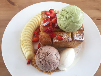 High angle view of ice cream in plate on table