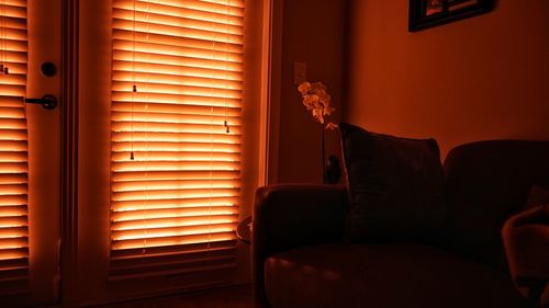 Close-up of closed windows in living room