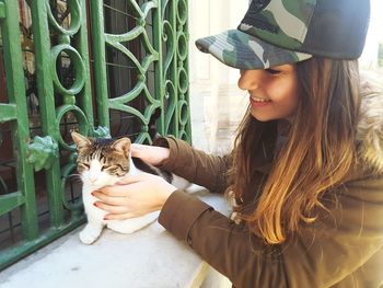 Young woman with cat