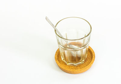 Close-up of drink against white background
