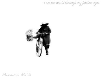 Rear view of man riding motorcycle against white background