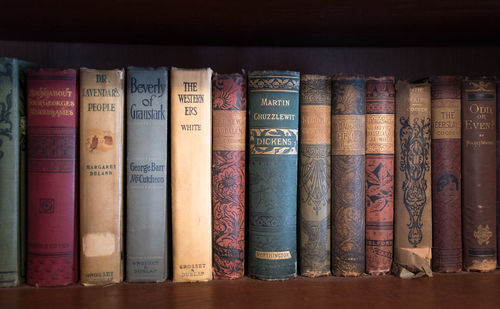 Close-up of old books in shelf