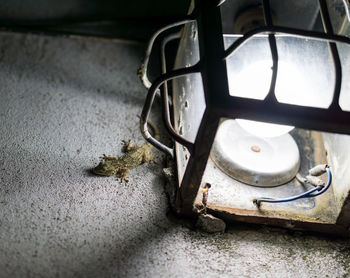 Close-up of abandoned vintage car on table