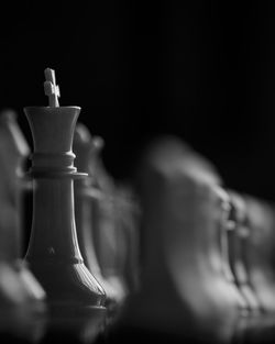 Close-up of chess against black background