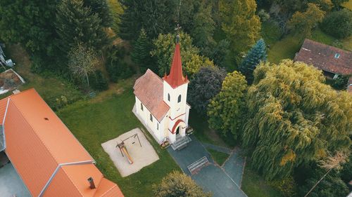 High angle view of trees and buildings against sky