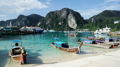 Boats moored at waterfront