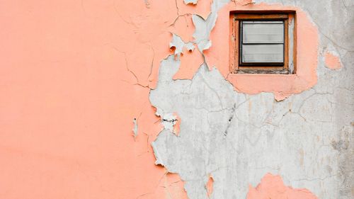 Full frame shot of weathered wall of house