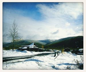 Scenic view of snow covered mountains