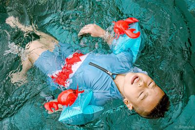 High angle view of man swimming in pool