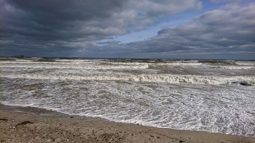 Scenic view of beach against sky