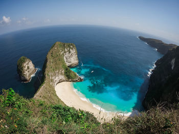 High angle view of sea shore against sky