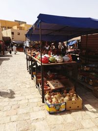 People at market stall