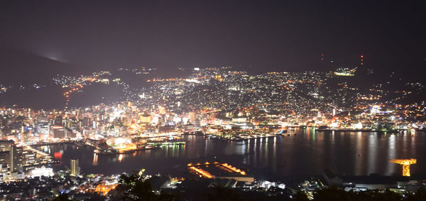 High angle view of illuminated city buildings