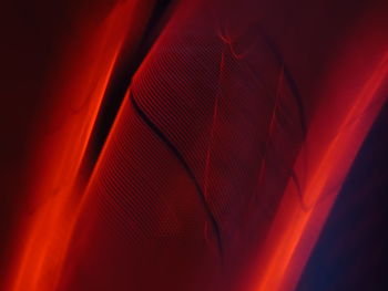 Full frame shot of red fire against black background