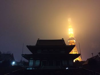 Low angle view of illuminated built structure