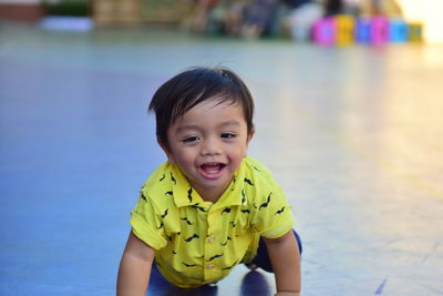 Portrait of cute baby boy in swimming pool