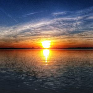 Scenic view of sea at sunset