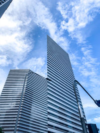 Low angle view of modern buildings against sky