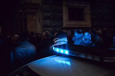 Illuminated siren on police car at night