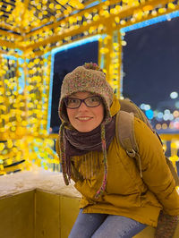 Portrait of a smiling young woman outdoors