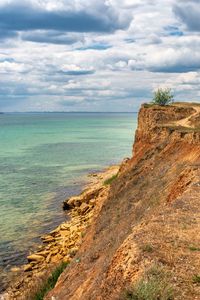 Public beach in the city of yuzhne, ukraine. panoramic view on a sunny spring day