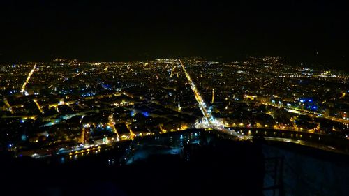 Illuminated cityscape at night