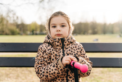 Portrait of cute girl looking away