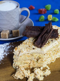 Close-up of cake and milk on table