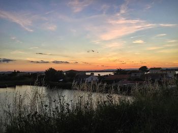 Scenic view of landscape against sky during sunset