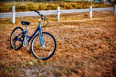 Bicycle parked on landscape