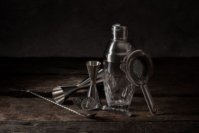 Close-up of wine bottles on table