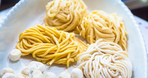 High angle view of pasta in plate on table