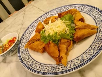 Close-up of served food on table