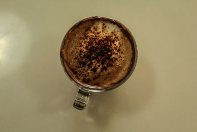 Close-up of coffee cup on table