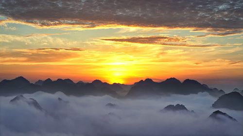 Scenic view of mountains at sunset