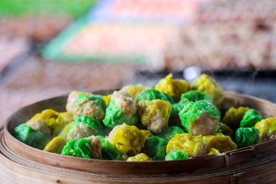 Close-up of vegetables in basket on table